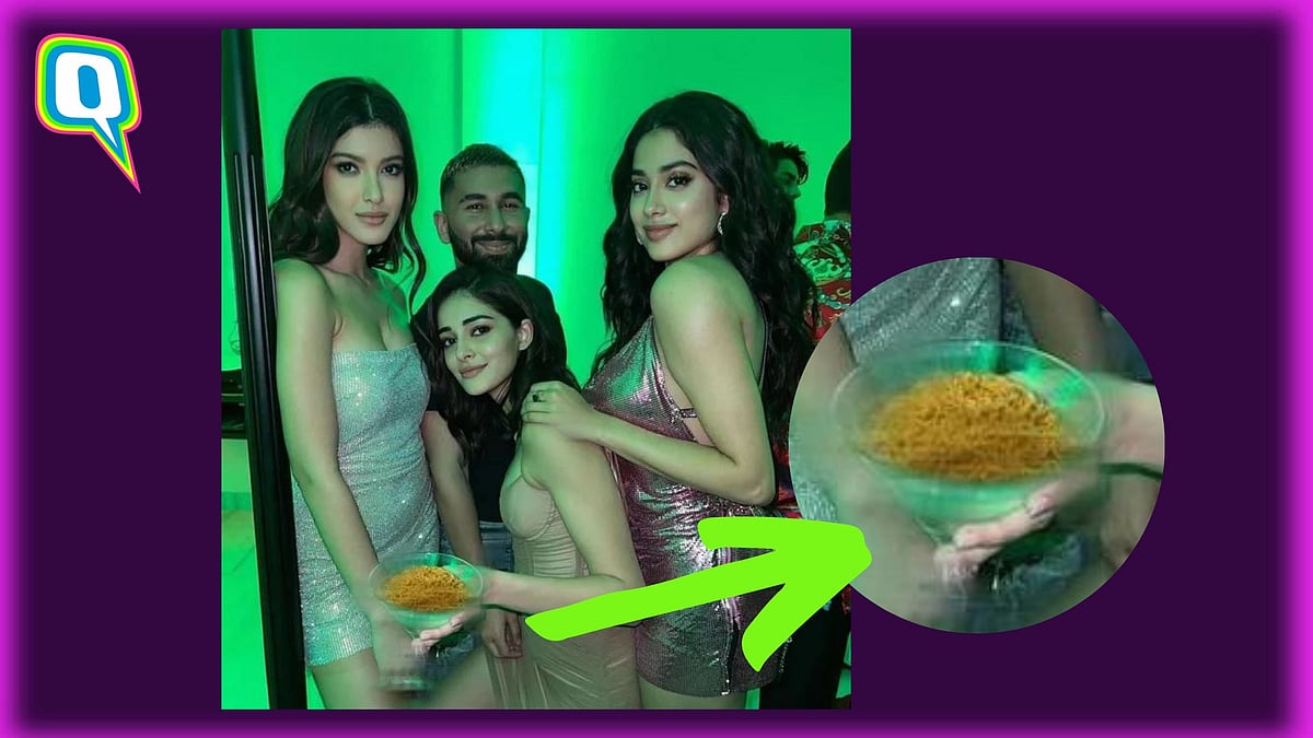 <div class="paragraphs"><p>Ananya Panday holding a glass of aloo bhujia.</p></div>