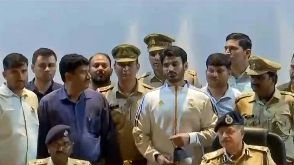 <div class="paragraphs"><p>BJP leader and accused Shrikant Tyagi at press conference by Noida Police.</p></div>