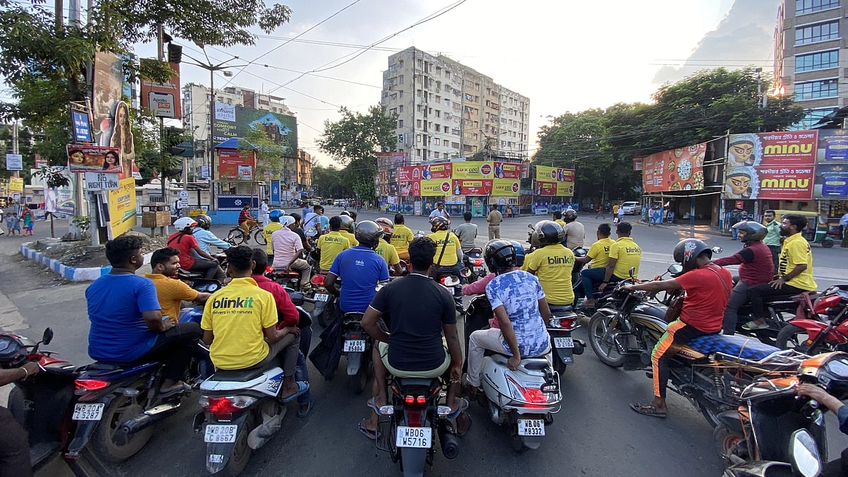 <div class="paragraphs"><p>Blinkit delivery partners on their bike rally to the State Secretariat</p></div>