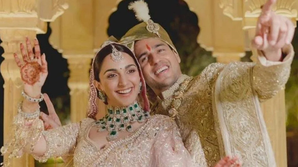 <div class="paragraphs"><p>The newlyweds weds strike a pose for the camera.</p></div>