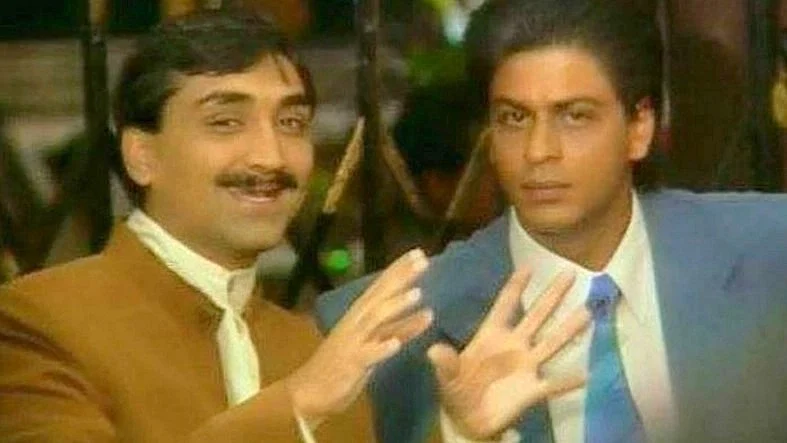 <div class="paragraphs"><p>A rare picture of director Aditya Chopra with Shah Rukh Khan.</p></div>