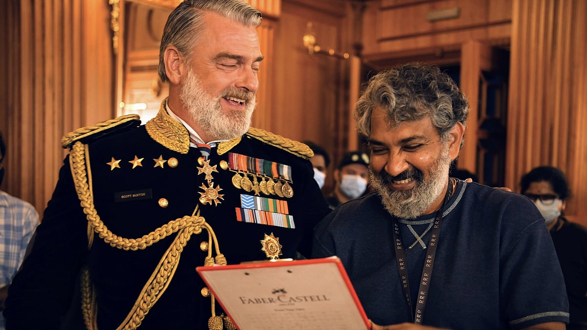 <div class="paragraphs"><p>SS Rajamouli with Ray Stevenson on the sets of<em> RRR.</em></p></div>