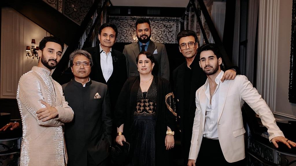 <div class="paragraphs"><p>Karan Johar, Guneet Monga attend the screening for <em>Kill</em> at TIFF 2023.</p></div>