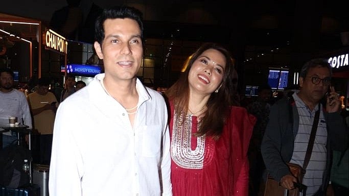 <div class="paragraphs"><p>Randeep Hooda and Lin Liashram at the Mumbai airport.</p></div>