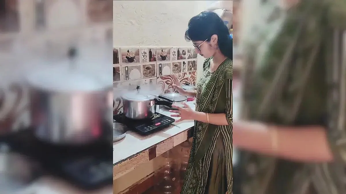 <div class="paragraphs"><p>Video of a woman ironing clothes with pressure cooker goes viral.</p></div>