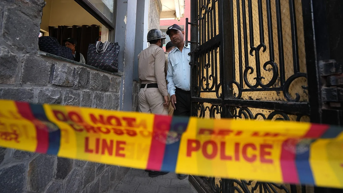 <div class="paragraphs"><p>Police and fire department personnel outside a school in Delhi after multiple schools received a bomb threat.</p></div>