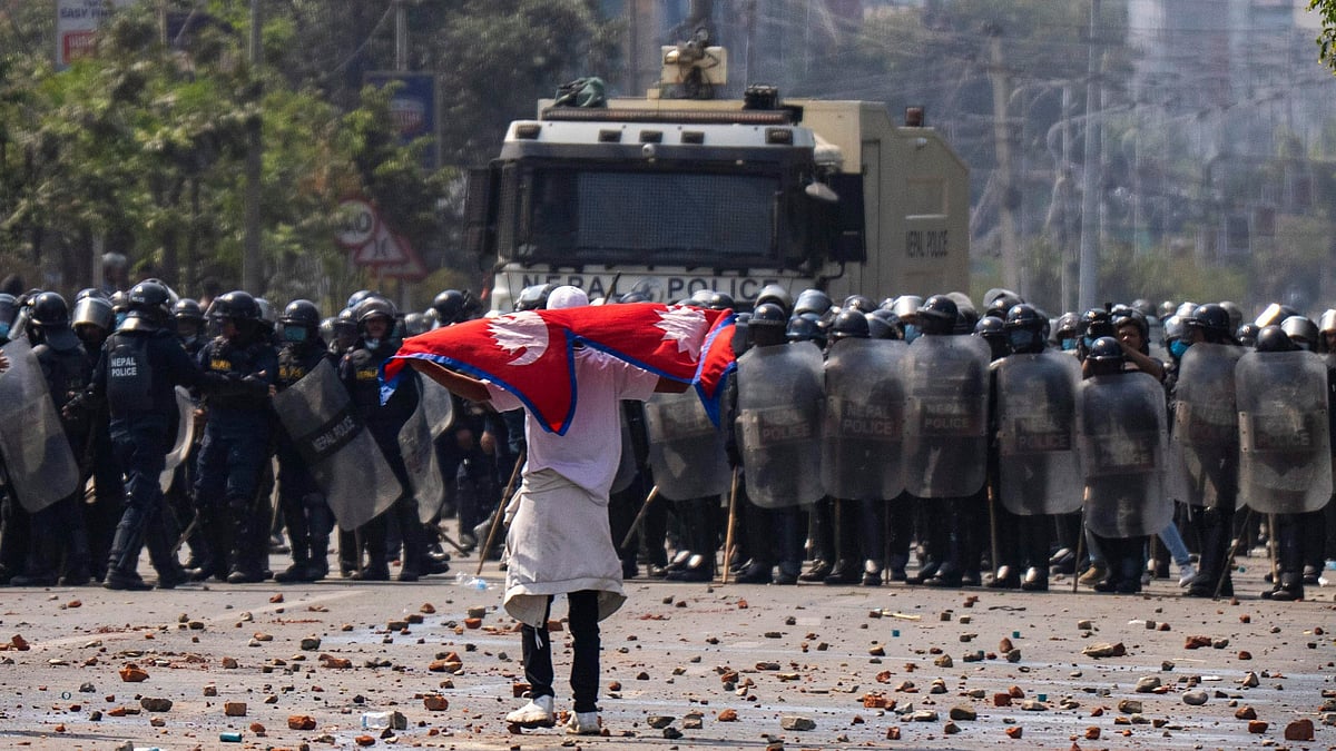 <div class="paragraphs"><p>Many protesters and police officers were  injured in the clashes in Nepal, which led the government to impose a curfew in parts of the city.</p></div>