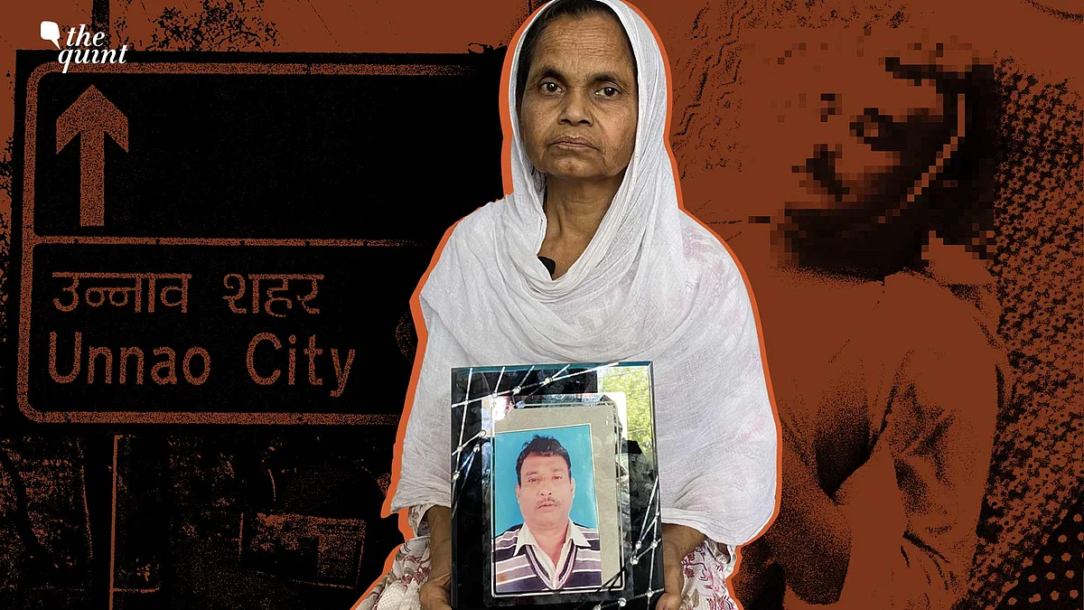 <div class="paragraphs"><p>Roshan Jahan, Mohd Sharif's wife holds his photo as she recalled how he was killed on Holi.</p></div>