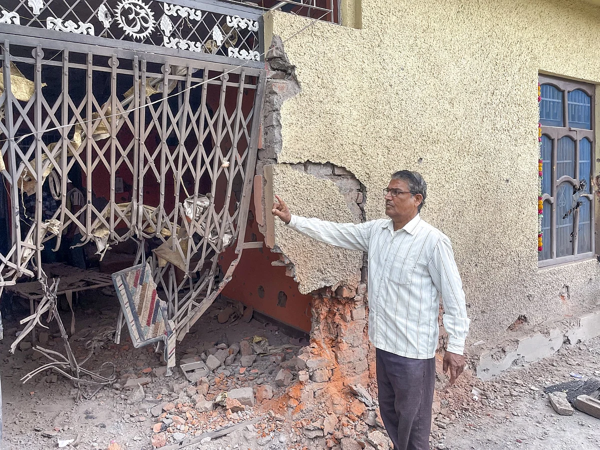 <div class="paragraphs"><p> A civilian shows a damaged property after heavy firing and shelling by Pakistan military overnight across the Line of Control and International Border, in Rajouri district of Jammu and Kashmir.&nbsp;</p><p></p></div>