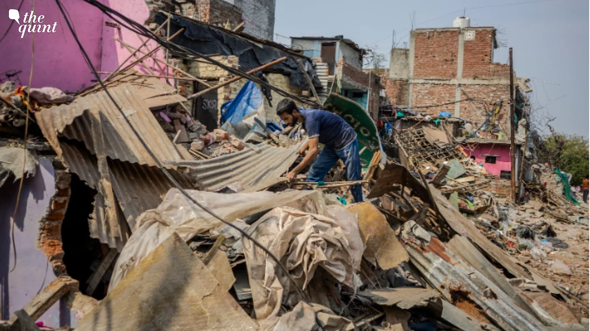 <div class="paragraphs"><p>Aarif walks through the debris of his house, picking through what little is left.</p></div>