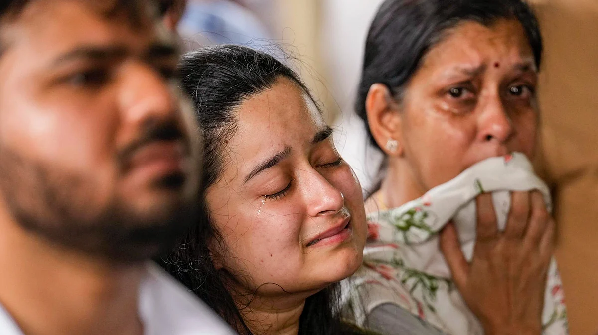 <div class="paragraphs"><p>Family members mourn the loss of Shubh and Shagun Modi, victims of the Air India crash, during their last rites in Ahmedabad on Sunday, 15 June.&nbsp;</p></div>