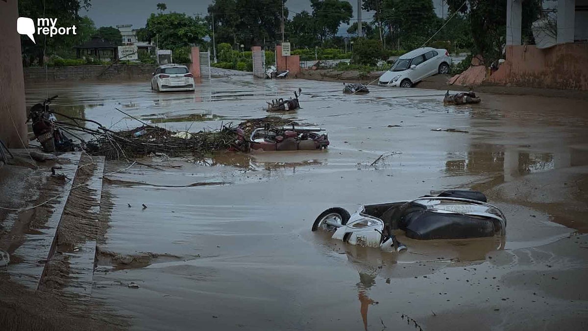 <div class="paragraphs"><p>Houses, cars swept away as Tawi River floods Jammu.</p><p></p></div>