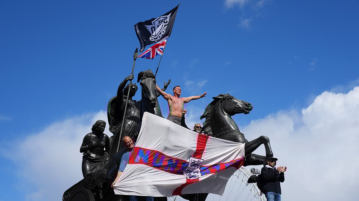<div class="paragraphs"><p>Protesters taking part in the anti-immigration rally organised by Tommy Robinson on Saturday, 13 September.&nbsp;</p></div>