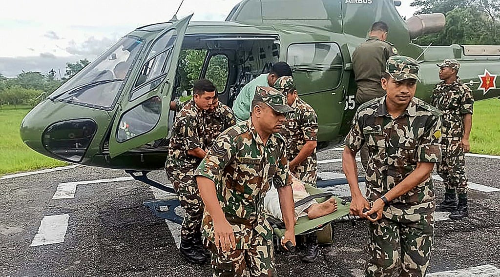 <div class="paragraphs"><p>Nepal has deployed security forces with helicopters and motorboats to assist the rescue efforts.</p></div>