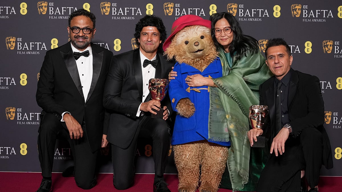 <div class="paragraphs"><p>Alan McAlex, from left, Farhan Akhtar, Lakshmipriya Devi, and Ritesh Sidhwani pose with the award for children's & family film for Boong at the 79th British Academy Film Awards, BAFTAs, in London.</p></div>