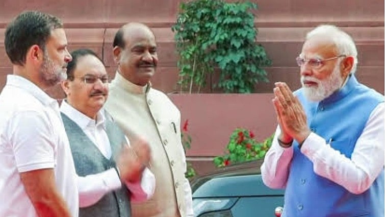 <div class="paragraphs"><p>Modi And Rahul Gandhi Share Rare Cordial Exchange In Parliament</p></div>