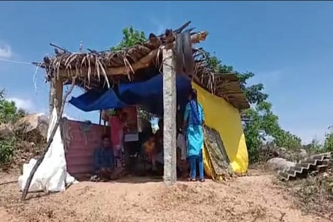 A family staying in a makeshift shelter in Moram village, Chittoor, Andhra Pradesh