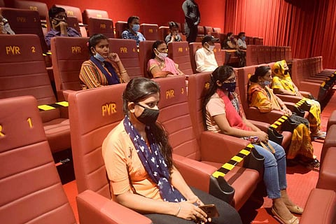 Audience inside movie theatre