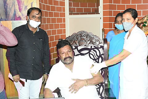 Karnataka Minister BC Patil getting vaccinated at home