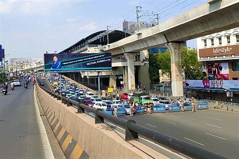 Hyderabad Police stop vehicles near Begumpet to enforce lockdown.