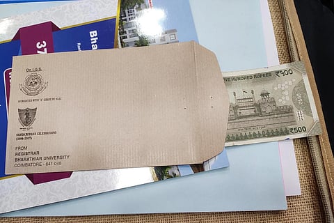 The envelope with Rs 500 note given to journalists at Bharathiyar University convocation