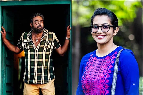 Biju Menon and Parvathy