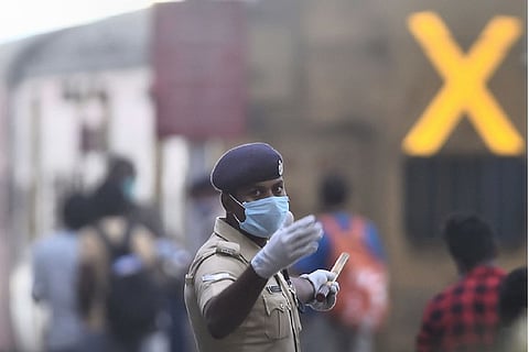 A policeman in a mask 