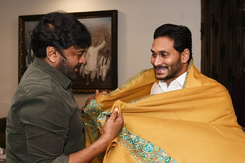 Chiranjeevi greeting Andhra Chief Minister YS Jagan Mohan Reddy with a shawl