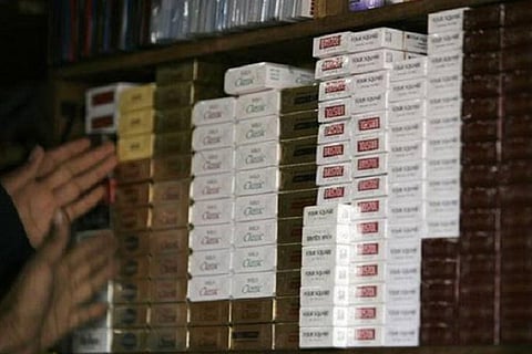 Stacked pile of cigarette packets