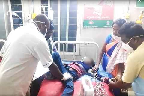 small boy treated by doctor