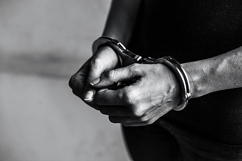 Man in Handcuff