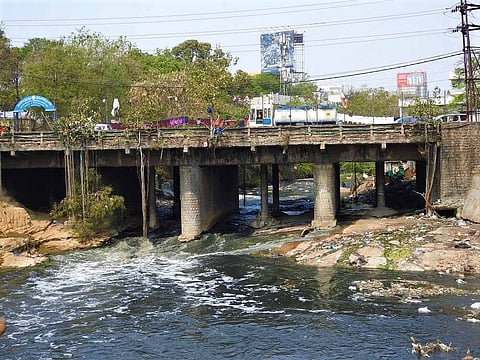 'We have to live with it': Stench from Hussain Sagar nala affects life in slums nearby