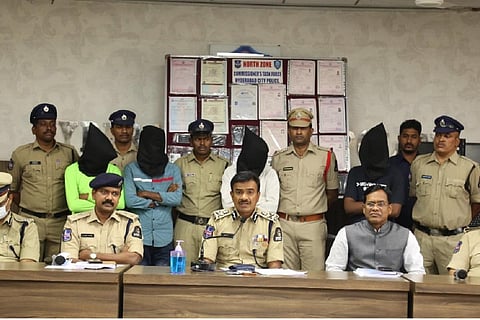 Hyderabad police with four accused in the kidnapping case