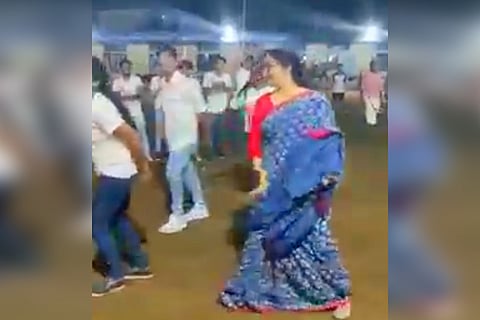 Collector Divya Iyer dancing along with college students