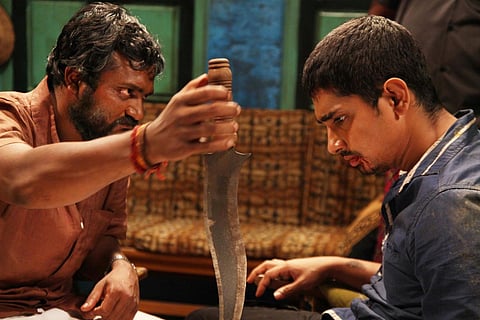 Siddharth and Bobby Simha in Jigarthanda 