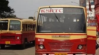 KSRTC red bus parked at a bus station