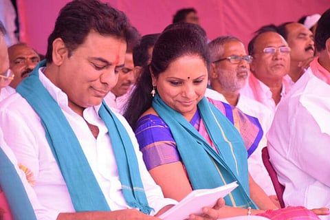 A file image of KTR and Kavitha at a TRS event