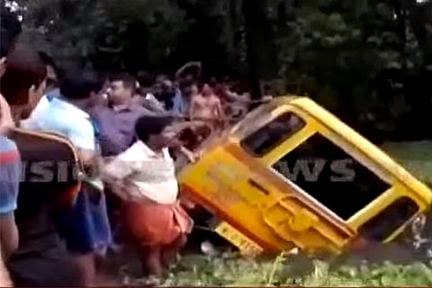 Two toddlers and their nanny die after school van falls into pond in Kochi