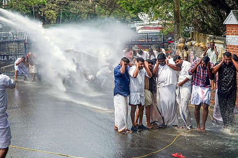 Police use water cannons against protesters
