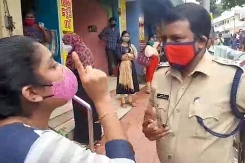 Student questioning police officer