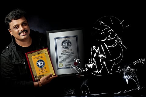 Drawing figures in thin air: Kerala artist wins award for ‘light painting’