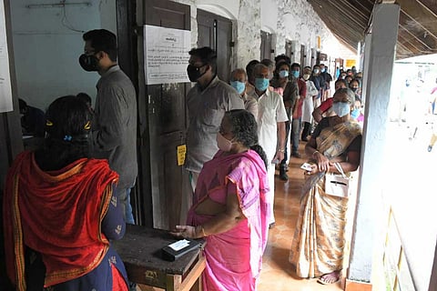 Voters waiting to cast votes