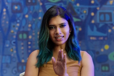 Actor Dushara Vijayan in charact4er introduction video from Natchathiram Nagargiradhu 