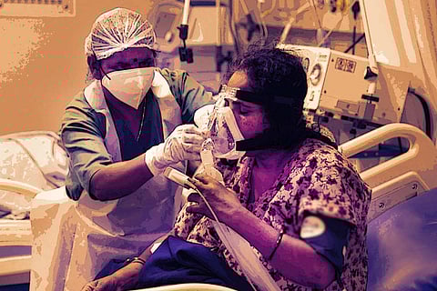 A patient being helped with oxygen at a hospital