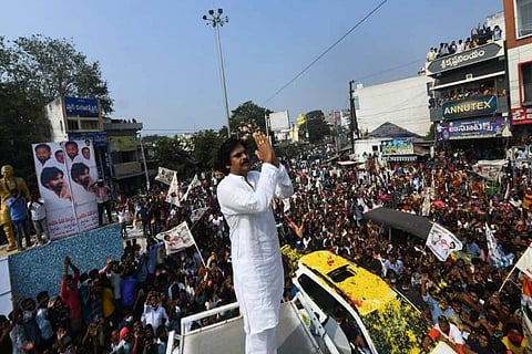 Pawan Kalyan greets a huge gathering in Krishna district during a road show