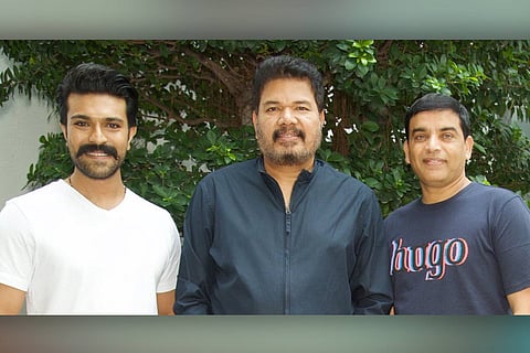 Actor Ram Charan, director S Shankar and producer Dil Raju in the frame
