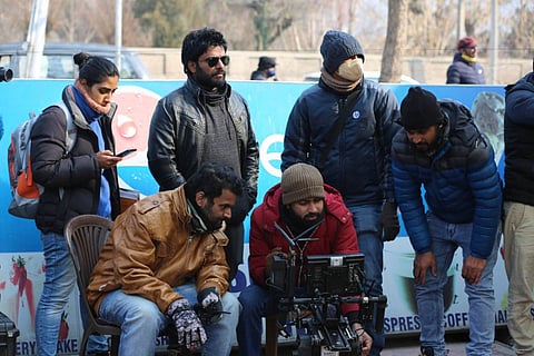 Director Rohit Padaki along with other crew members on the sets of Rathnan Prapancha. 
