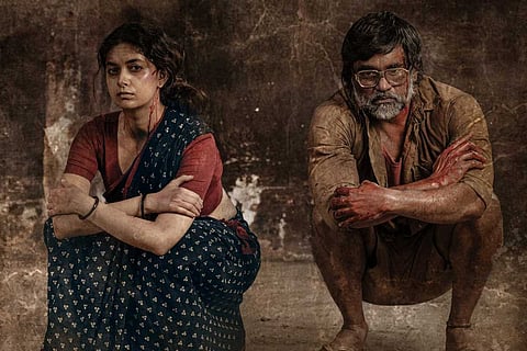 Keerthy Suresh and Selvaraghavan in Saani Kaayidham poster