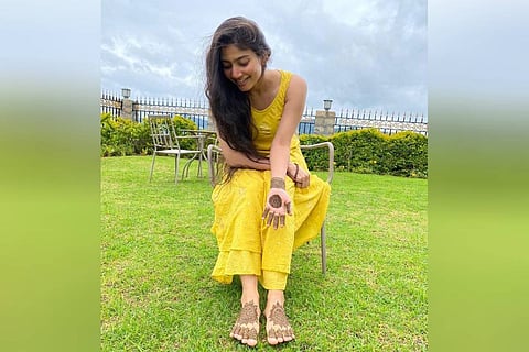 Sai Pallavi is seen with mehendi applied on her hands and legs