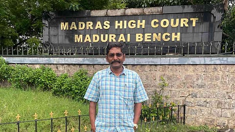 YouTuber Savukku Shankar standing before the Madurai Bench of the Madras High Court